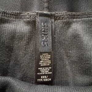 Skims black cotton ribbed legging.